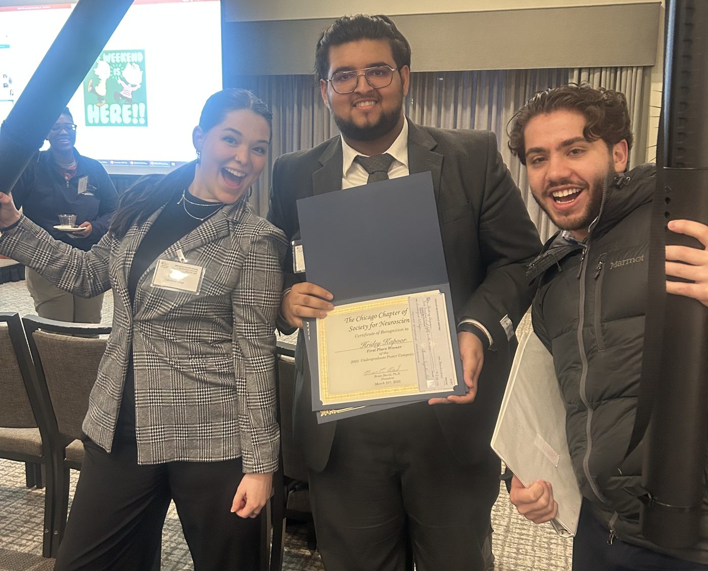 Holding the award certificate with Schwalbe Lab labmates